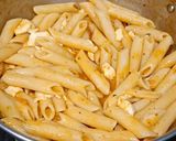A picture of step 4 of Penne in red sauce with herbs.