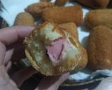 Foto del paso 7 de la receta: Salchichas envueltas en puré de papas