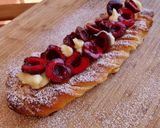 Foto del paso 23 de la receta: Trenza de brioche hojaldrado con crema y cerezas