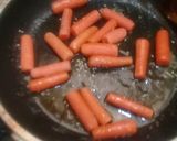 A picture of step 3 of Orange Glaze Roasted BabyCarrots.
