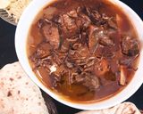 A picture of step 8 of Beef Nihari with Naan.