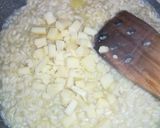 Foto del passaggio 9 della ricetta Risotto alla crema di porro, formaggio di montagna e pepe