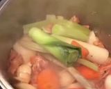 Foto del paso 2 de la receta: Arroz meloso de gambones y calamares