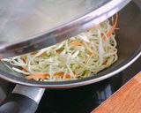 Hình bước làm 3 của món Bắp Cải Cà Rốt Xào Cá Ngừ Hộp