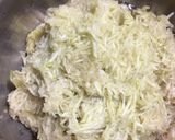 A picture of step 1 of Lauki / Dudhi Halwa.