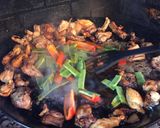 A picture of step 4 of Paella with Vegetables and Meat.