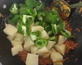 A picture of step 4 of Potato capsicum veg.