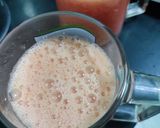 A picture of step 2 of Pomegranate orange juice.