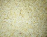 A picture of step 1 of Egg and parsley fried rice.