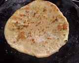 A picture of step 3 of Coconut stuffed parandaa.
