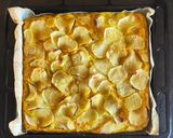 A picture of step 12 of Milk, Turmeric, and Potato Focaccia with Herbes de Provence.