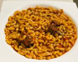 A picture of step 4 of Macaroni jollof.