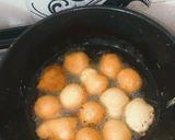 A picture of step 4 of Puff puff with crushed Oreo.