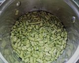 A picture of step 1 of Masala Gwar/Guar ki fhali ki bhaji.