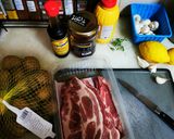 A picture of step 1 of Pork Chops with Honey, Soy Sauce, Mustard, and Lemon Baby Potatoes in a Dutch Oven.