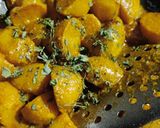 A picture of step 6 of Masala baby potatoes.