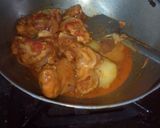A picture of step 35 of Kulcha and bhuna chicken masala.
