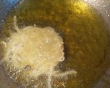 A picture of step 7 of Spicy Schezwan Noodle Nest.
