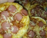 Foto langkah ke 5 dari resep Pizza mini sederhana.