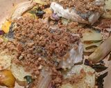 A picture of step 7 of Baked hake with Parmesan crumb, potatoes + leeks.