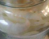 A picture of step 4 of Refrigerator Pickled Cucumber and onion.