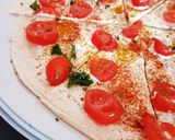 Une image de l'étape 2 de Wraps apéritifs fromage ail et fines herbes et sauce poivre tomates 🍅.