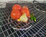 A picture of step 1 of Mexican Charred Tomato Garlic Salsa.
