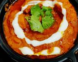 A picture of step 8 of Butter Chicken.