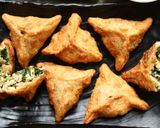 A picture of step 12 of Zingy Spinach Parcels.