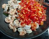 A picture of step 1 of Prawns onion tomato masala.