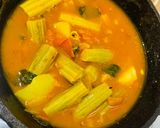 A picture of step 4 of Muniga badi jhola (Drumsticks & sun dried lentil dumplings).