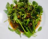 A picture of step 4 of Mustard leaves in Garlic sauce.