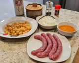 Foto del paso 1 de la receta: Garbanzos en salsa de piquillos y tomate con salchichas frescas