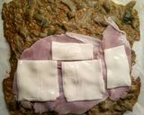 Foto del passaggio 8 della ricetta Girelle di carciofi con prosciutto cotto e sottilette 🎅⭐🎄