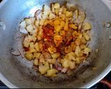 A picture of step 3 of Yummy Tummy Potato Pulao.