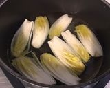 Une image de l'étape 2 de Gratins de jeunes endives au jambon cru sauce cajun et deux fromages.