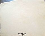 A picture of step 2 of Cinnamon roll.