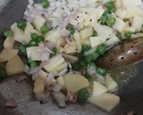 A picture of step 2 of Batata Kanda Poha.
