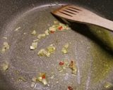 A picture of step 1 of Spaghetti nero di seppia.