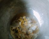 A picture of step 3 of Coconut jollof rice.