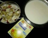 A picture of step 1 of Fruits and Dry fruits custard.