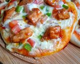 A picture of step 7 of Mini pizza(without cheese).