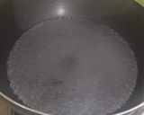 A picture of step 2 of Garlic rice.