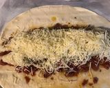 Une image de l'étape 3 de Rouleau farci tomates, fromage (origan, épices italiennes et pavot bleu).