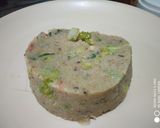 A picture of step 3 of Upma with lots of veggies.