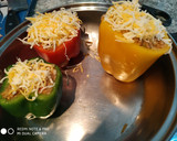 Foto del paso 7 de la receta: Pimientos rellenos de carne y arroz con queso rallado