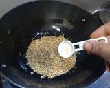 A picture of step 1 of Karivepaku karam podi curry leaves powder Andhra style.