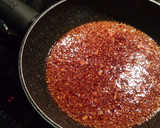 Foto del paso 5 de la receta: Salmón frito y brócolis salteados con ajos y pimentón