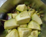 A picture of step 1 of Broad bean seeds and Brinjal sabji.
