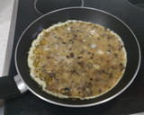Foto del paso 5 de la receta: Tortilla de ajetes y champiñones